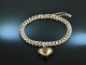 Around 1960! Pretty traditional costume dirndl bracelet with heart pendant silver gold plated garnet