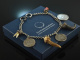 Water castle around 1950! Beautiful Charivari with pendants and coins silver 800