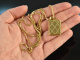 Around 1950! Medallion in book form with long chain silver-gilt