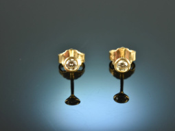 Around 1995! Pretty pair of brilliant solitaire earrings...