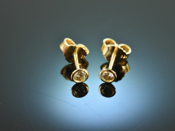 Around 1995! Pretty pair of brilliant solitaire earrings...