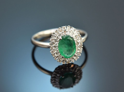 Fine emerald ring with diamonds 750 white gold