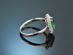 Fine emerald ring with diamonds 750 white gold