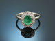 Fine emerald ring with diamonds 750 white gold