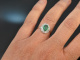 Fine emerald ring with diamonds 750 white gold