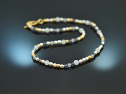Delicate necklace made of sapphires aquamarines and...