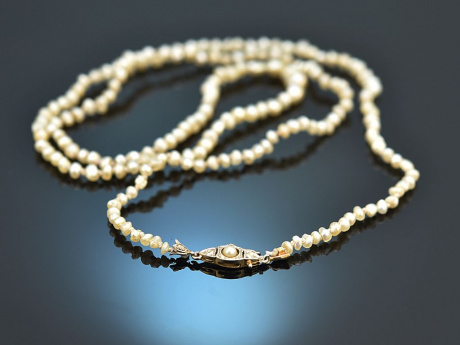 Around 1910! Delicate natural oriental pearl necklace with decorative clasp in gold 585 and platinum