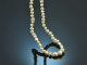 Around 1910! Delicate natural oriental pearl necklace with decorative clasp in gold 585 and platinum