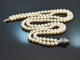 Around 1975! Fine 2-row Akoya cultured pearl necklace with tanzanite and diamonds white gold 585