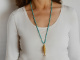 Around 1970! Filigree fish pendant with long turquoise chain, gold-plated silver