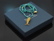 Around 1970! Filigree fish pendant with long turquoise chain, gold-plated silver
