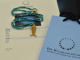 Around 1970! Filigree fish pendant with long turquoise chain, gold-plated silver