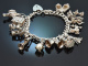 London um 1970! Sch&ouml;nes Bettelarmband mit 13 Charms und Herzschlie&szlig;e Sterlingsilber