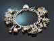 London um 1970! Sch&ouml;nes Bettelarmband mit 13 Charms und Herzschlie&szlig;e Sterlingsilber