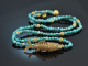 Around 1970! Filigree fish pendant with long turquoise chain, gold-plated silver