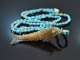 Around 1970! Filigree fish pendant with long turquoise chain in gold-plated silver