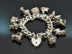 Birmingham 1973! Schweres englisches Bettelarmband mit 10 Charms und Herzschlie&szlig;e aus Silber 925