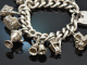 Birmingham 1973! Schweres englisches Bettelarmband mit 10 Charms und Herzschlie&szlig;e aus Silber 925