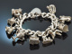 Birmingham 1973! Schweres englisches Bettelarmband mit 10 Charms und Herzschlie&szlig;e aus Silber 925