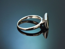 Simple design ring with green tourmaline in 585 white gold