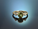 Edler Ring mit Peridot und Diamanten aus Gold 585