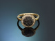 Edler Ring mit schwarzen und wei&szlig;en Brillanten aus Gold 585