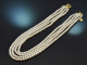 Wonderful four-row cultured pearl necklace with clasp in gold-plated 925 silver