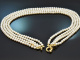 Wonderful four-row cultured pearl necklace with clasp in gold-plated 925 silver