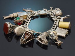 Birmingham 1972! Lavish charm bracelet with 14 charms and...