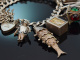 Birmingham 1972! Lavish charm bracelet with 14 charms and heart clasp made of 925 silver