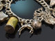 Birmingham 1972! Lavish charm bracelet with 14 charms and heart clasp made of 925 silver