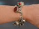 Birmingham 1972! Lavish charm bracelet with 14 charms and heart clasp made of 925 silver