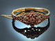 Bohemia around 1900! Beautiful garnet bangle made of gold-plated tombac