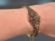 Bohemia around 1900! Beautiful garnet bangle made of gold-plated tombac