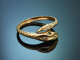 Um 1980! Zarter Schlangenring mit Diamanten und Smaragden aus Gold 585