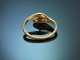 Um 1980! Zarter Schlangenring mit Diamanten und Smaragden aus Gold 585