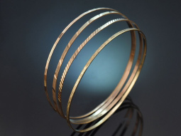 Um 1960! Schickes Set aus 4 feinen Sixties Armreifen aus...