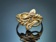 Vienna around 1915! Delicate snake ring with diamonds and sapphire in 585 gold