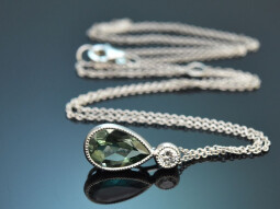 Fine green precious beryl and diamond pendant with a 750...