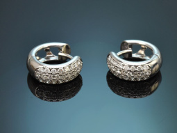 Elegant pav&eacute;-set diamond hoop earrings in 750...