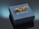 Circa 1910! Curved ribbon brooch with a Ceylon sapphire in 14-carat gold