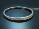 Circa 1950! An elegant bangle set with ca. 3.2 ct Old European Cut diamonds, in 750 white gold