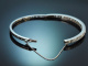 Circa 1950! An elegant bangle set with ca. 3.2 ct Old European Cut diamonds, in 750 white gold