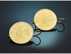 Pretty traditional-style coin earrings made from...