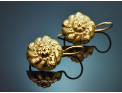 Circa 1930! Pretty traditional-style earrings made from...