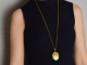 England circa 1910! Large gold-plated medallion pendant with a long silver chain