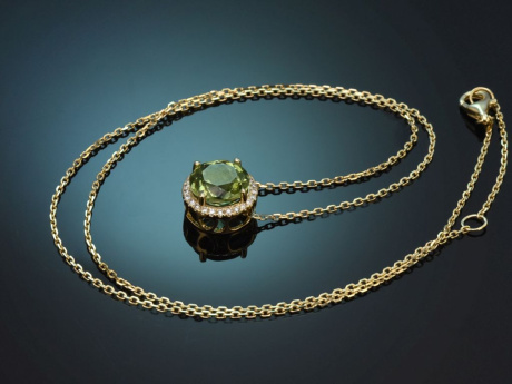 Delicate peridot and diamond pendant with a 585 gold chain