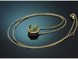 Delicate peridot and diamond pendant with a 585 gold chain
