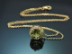 Delicate peridot and diamond pendant with a 585 gold chain