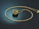 Delicate peridot and diamond pendant with a 585 gold chain